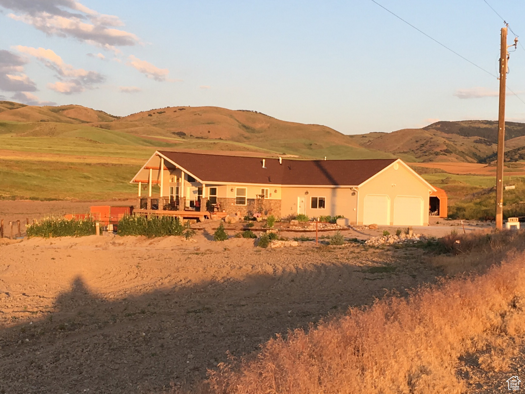 Exterior space with a mountain view and a garage