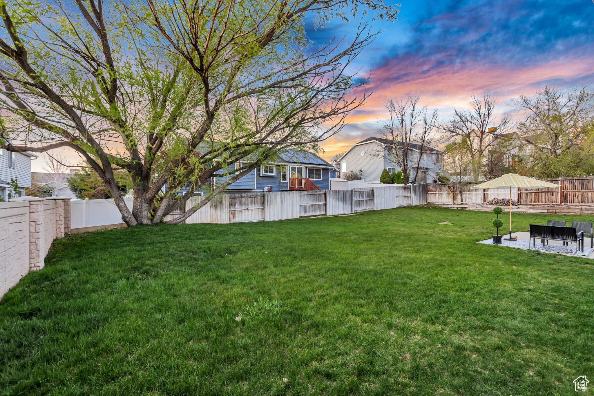 View of yard at dusk