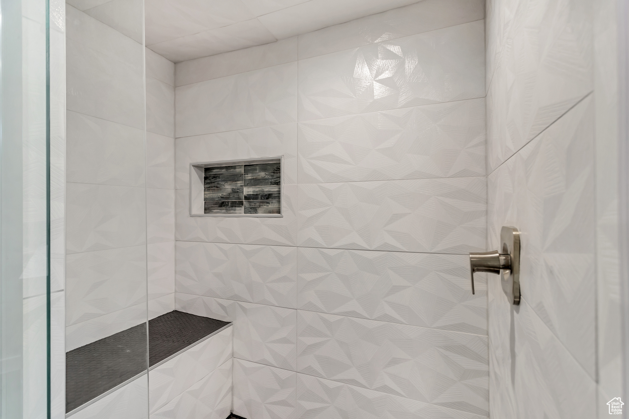 Bathroom with a tile shower