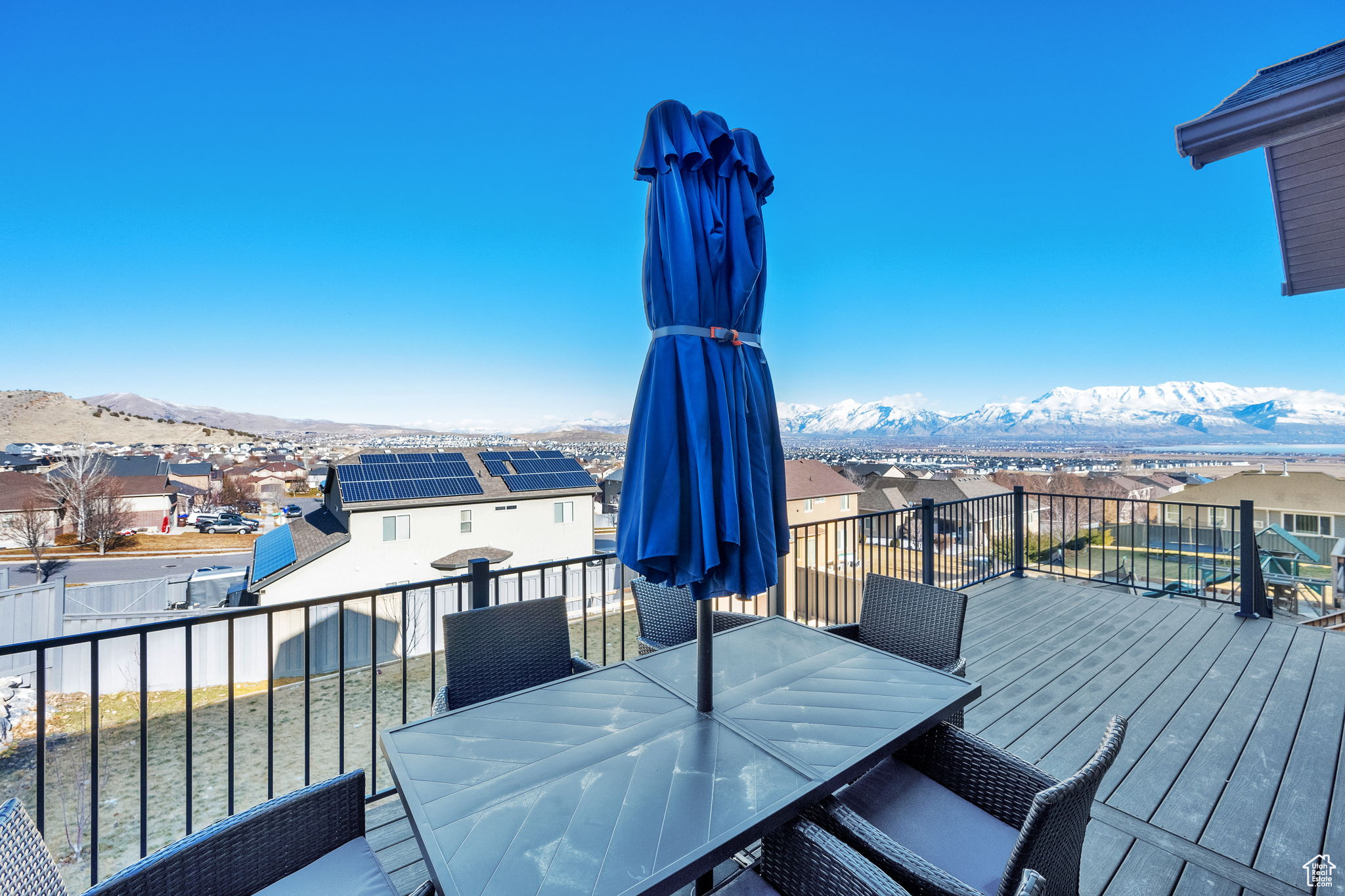 Wooden terrace featuring a mountain view