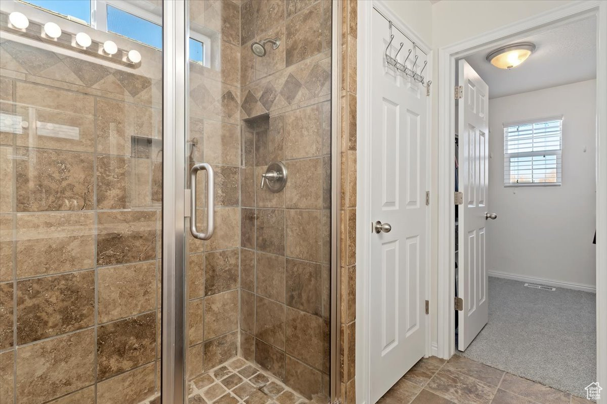 Bathroom featuring an enclosed shower