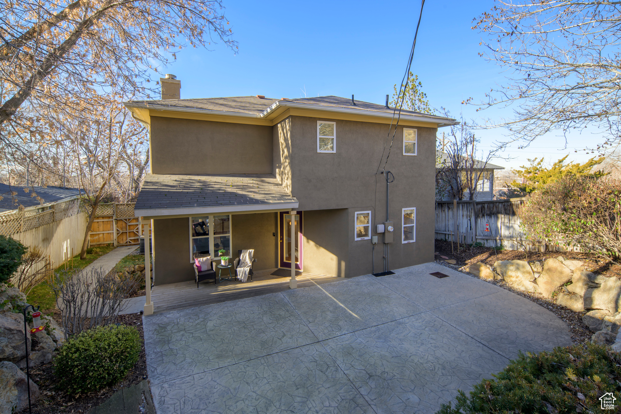 Rear view of property featuring a patio area