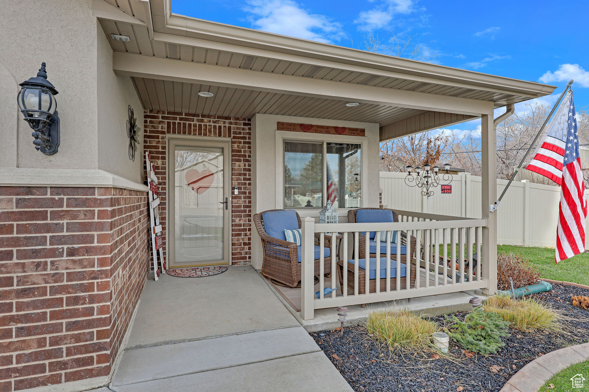 Property entrance with covered porch