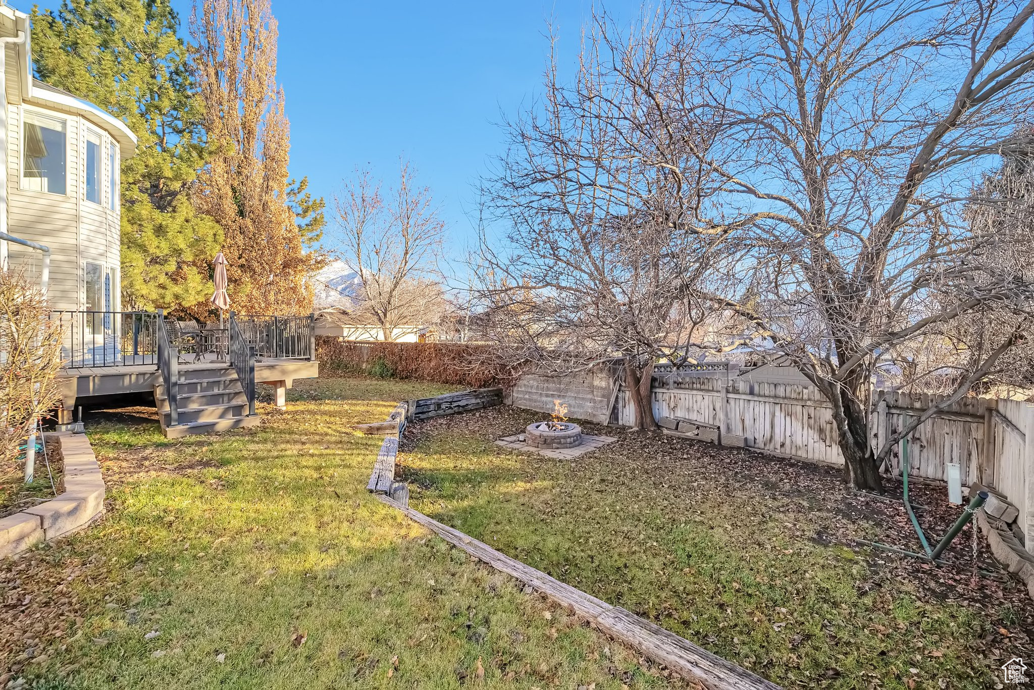 View of yard featuring a wooden deck