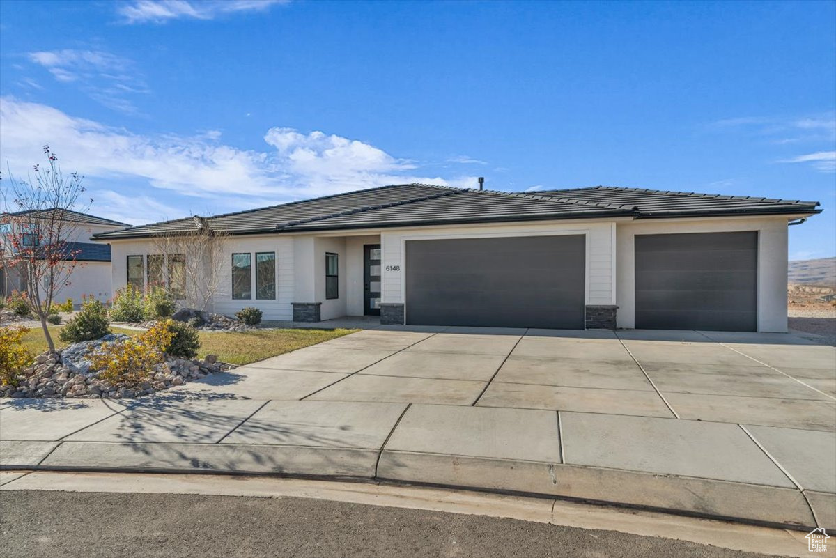 Ranch-style house with a garage