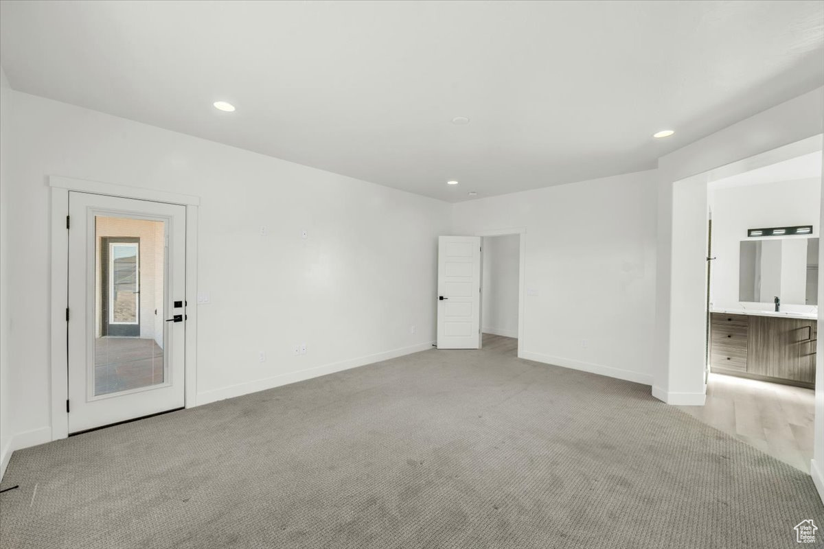 View of carpeted spare room