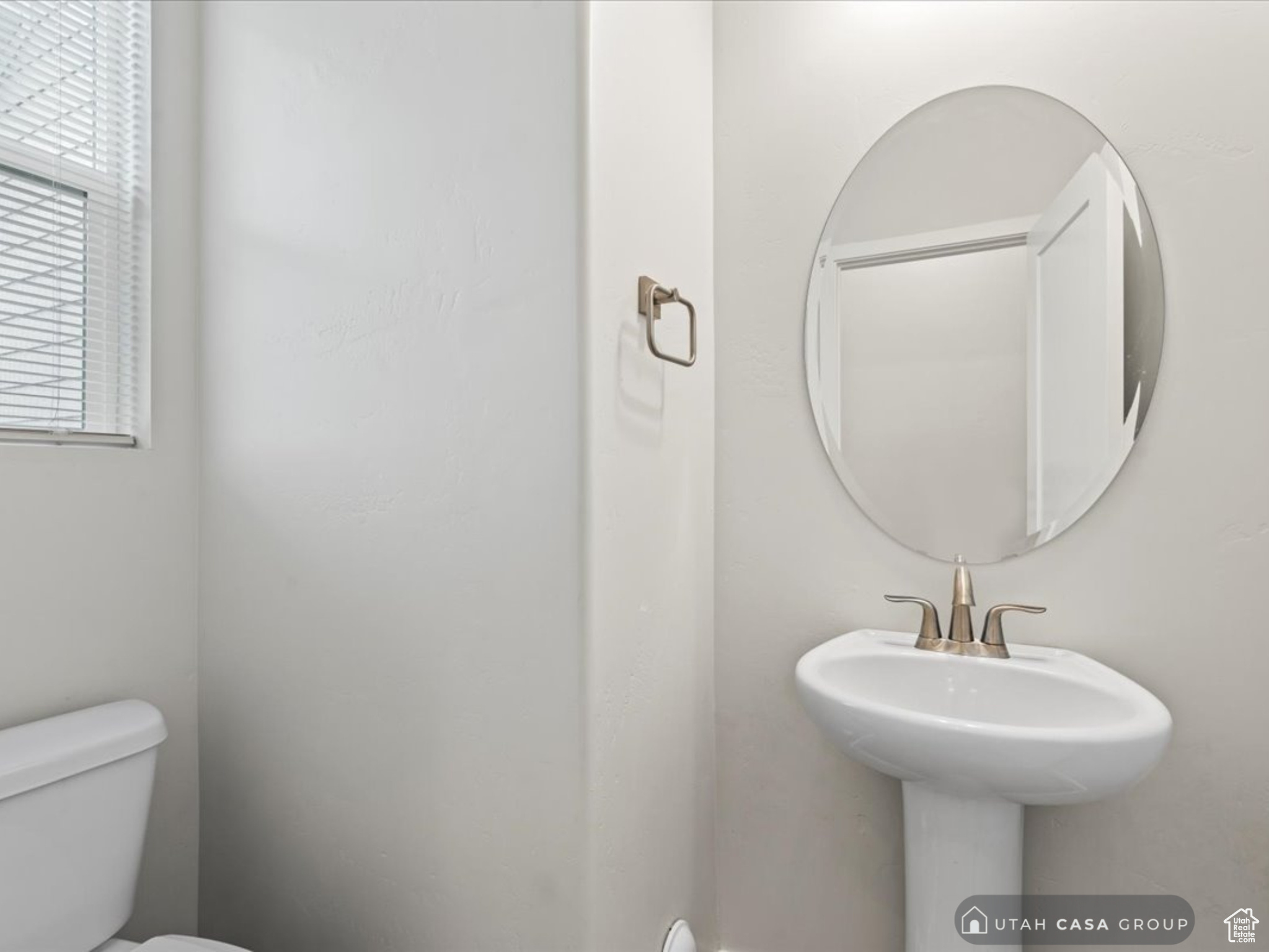 Bathroom with sink and toilet