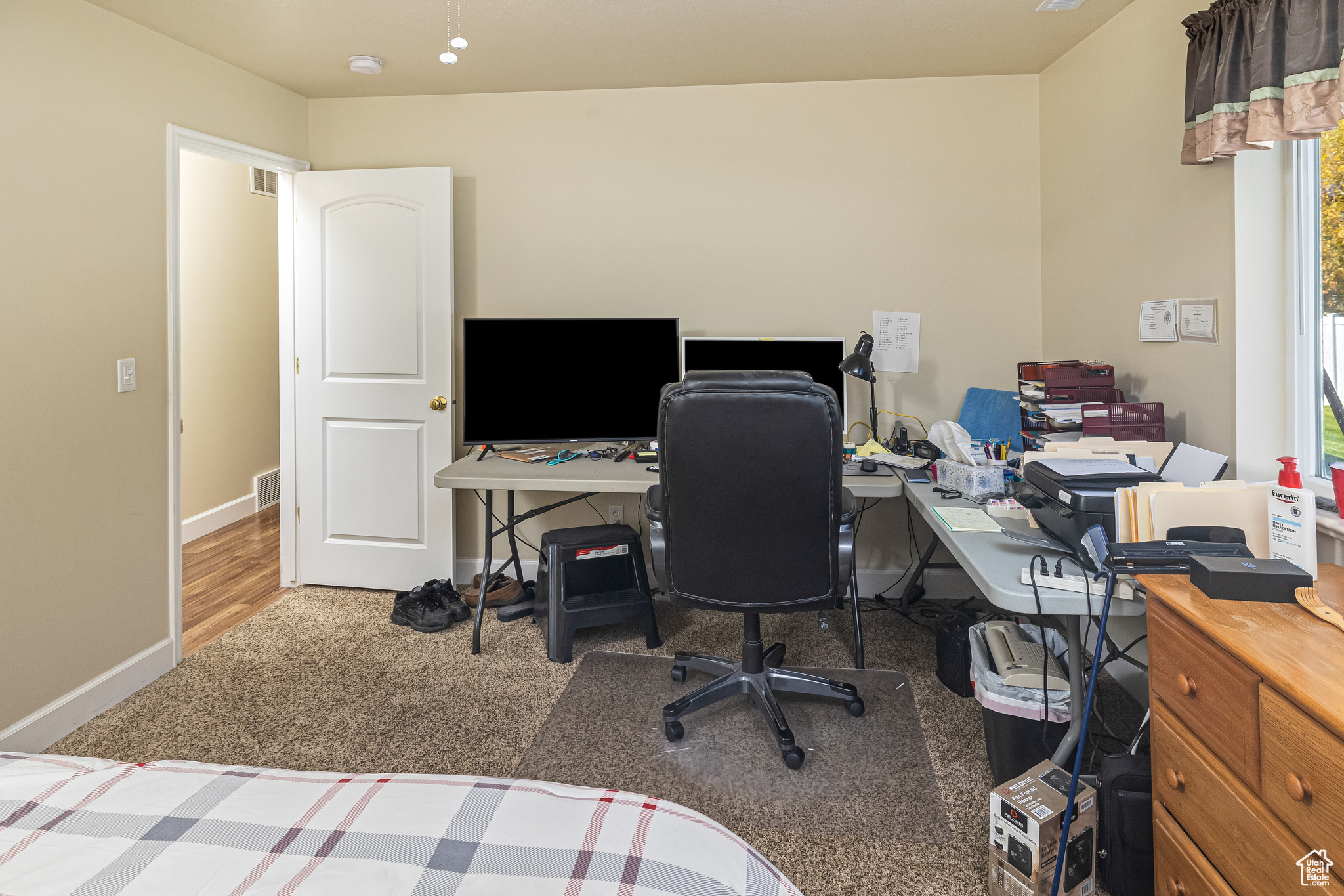 View of carpeted home office