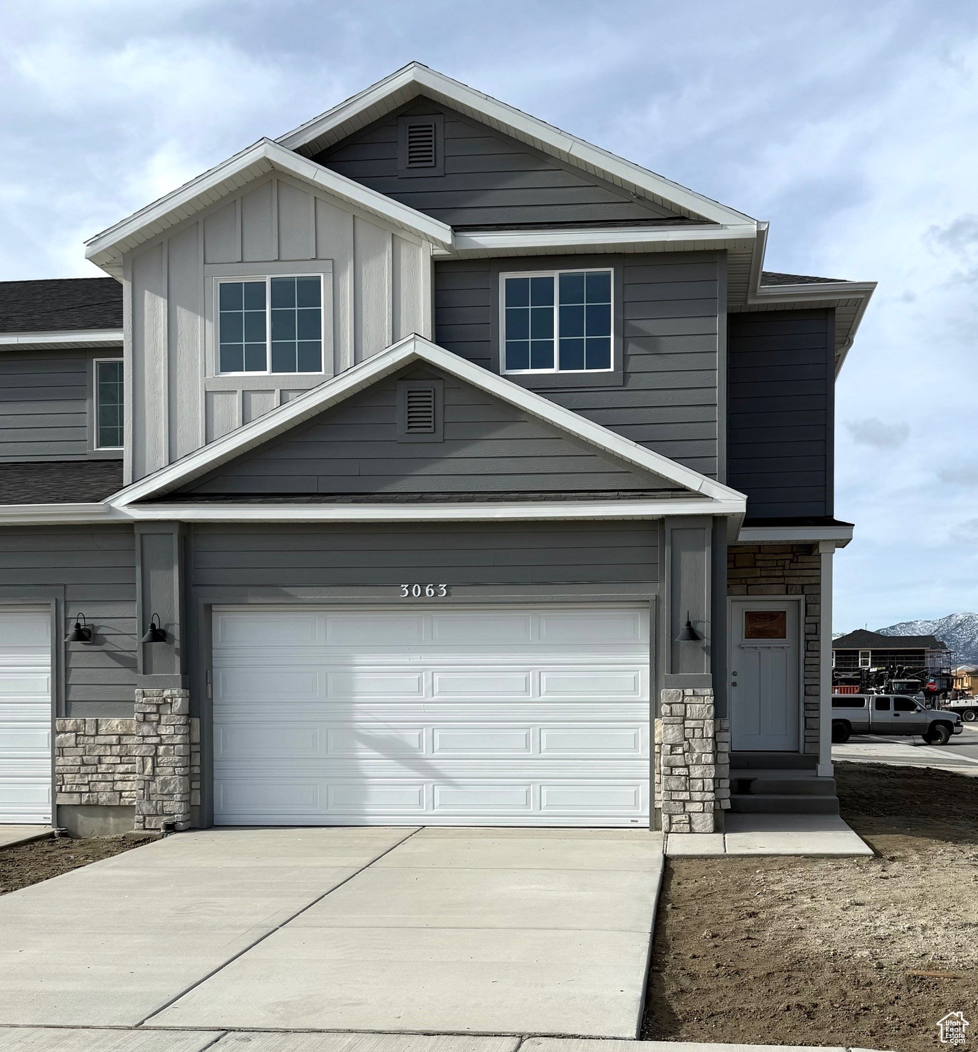 View of front of home with a garage