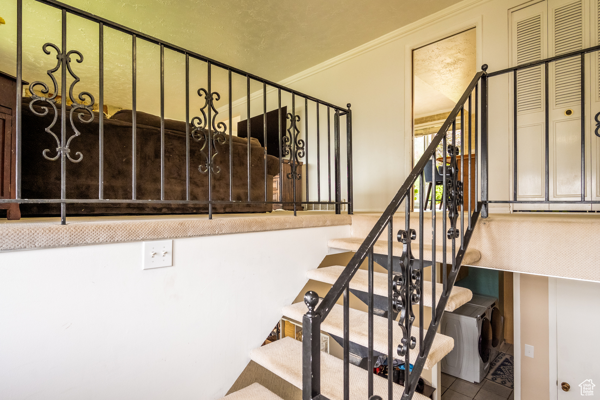 Stairs featuring ornamental molding