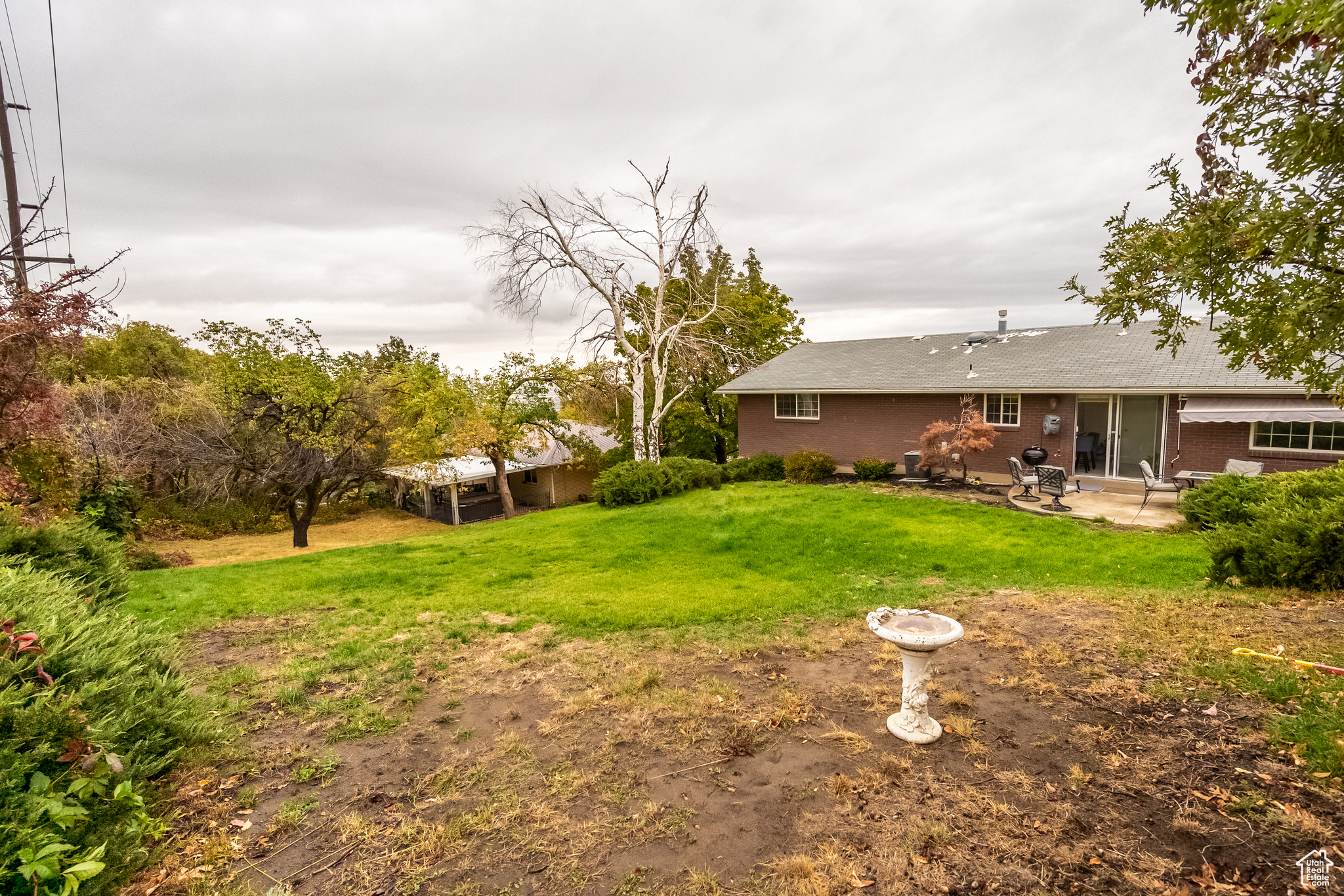 View of yard with a patio area