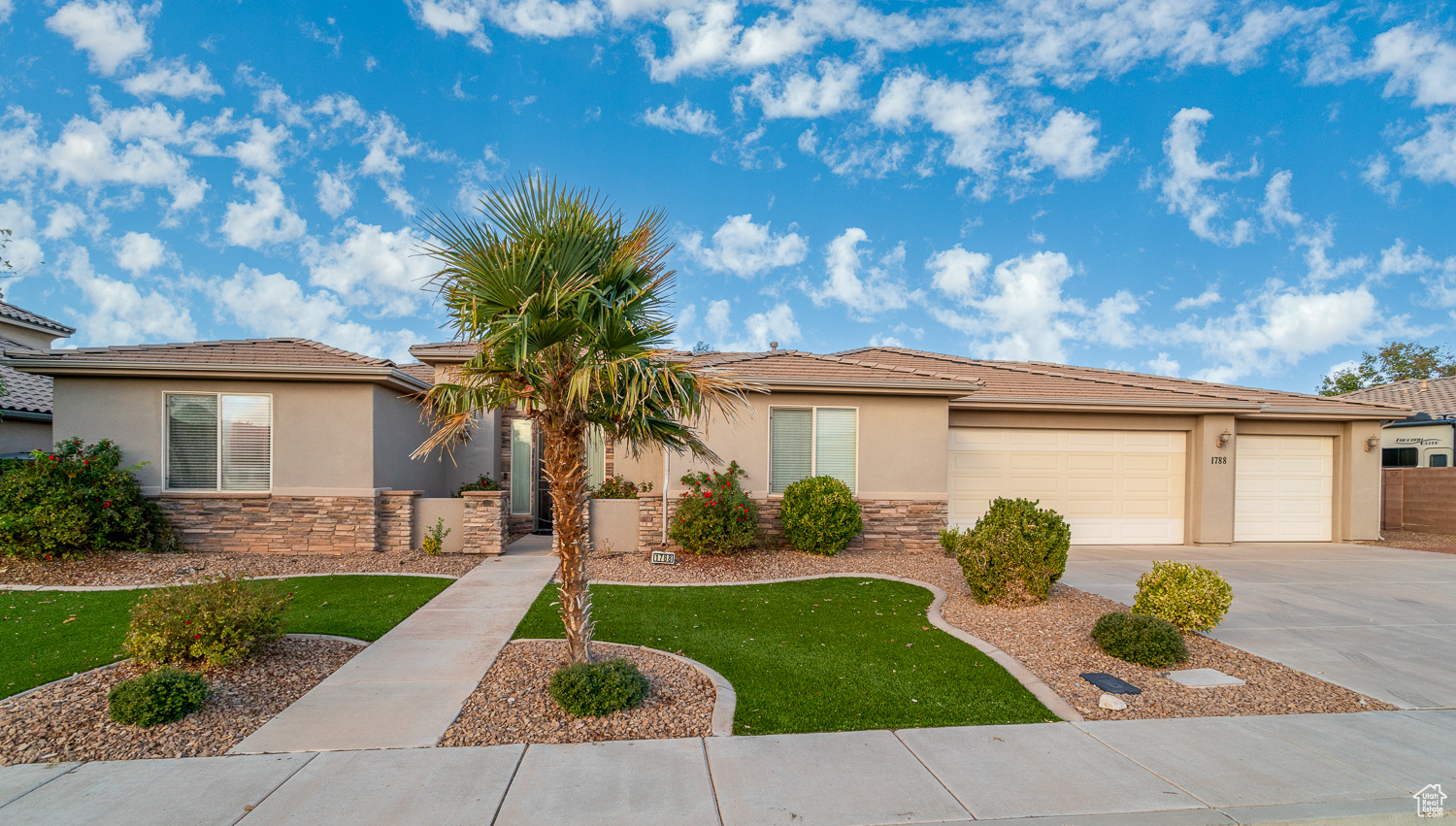 View of front of property with a garage