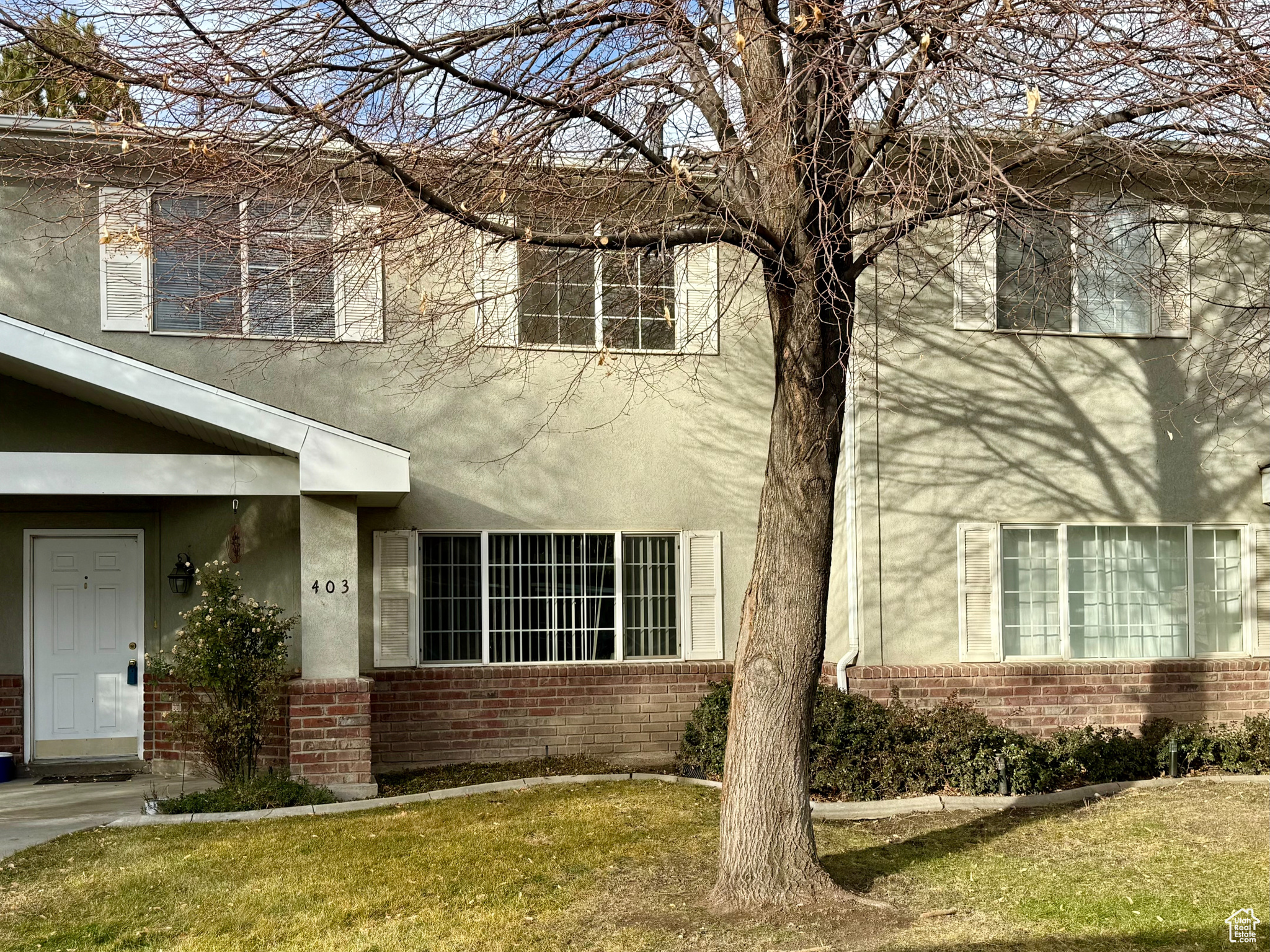 Exterior space featuring a front lawn