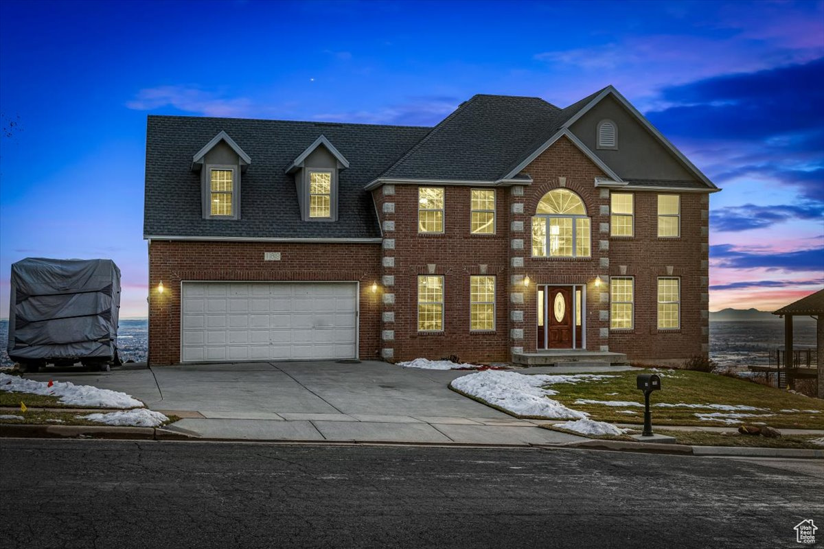 Colonial-style house with a garage