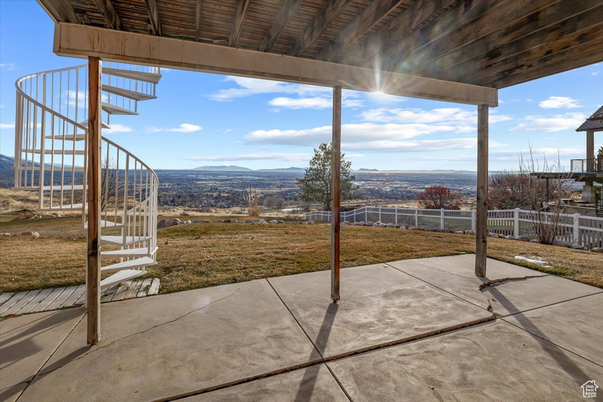 View of patio / terrace with a mountain view