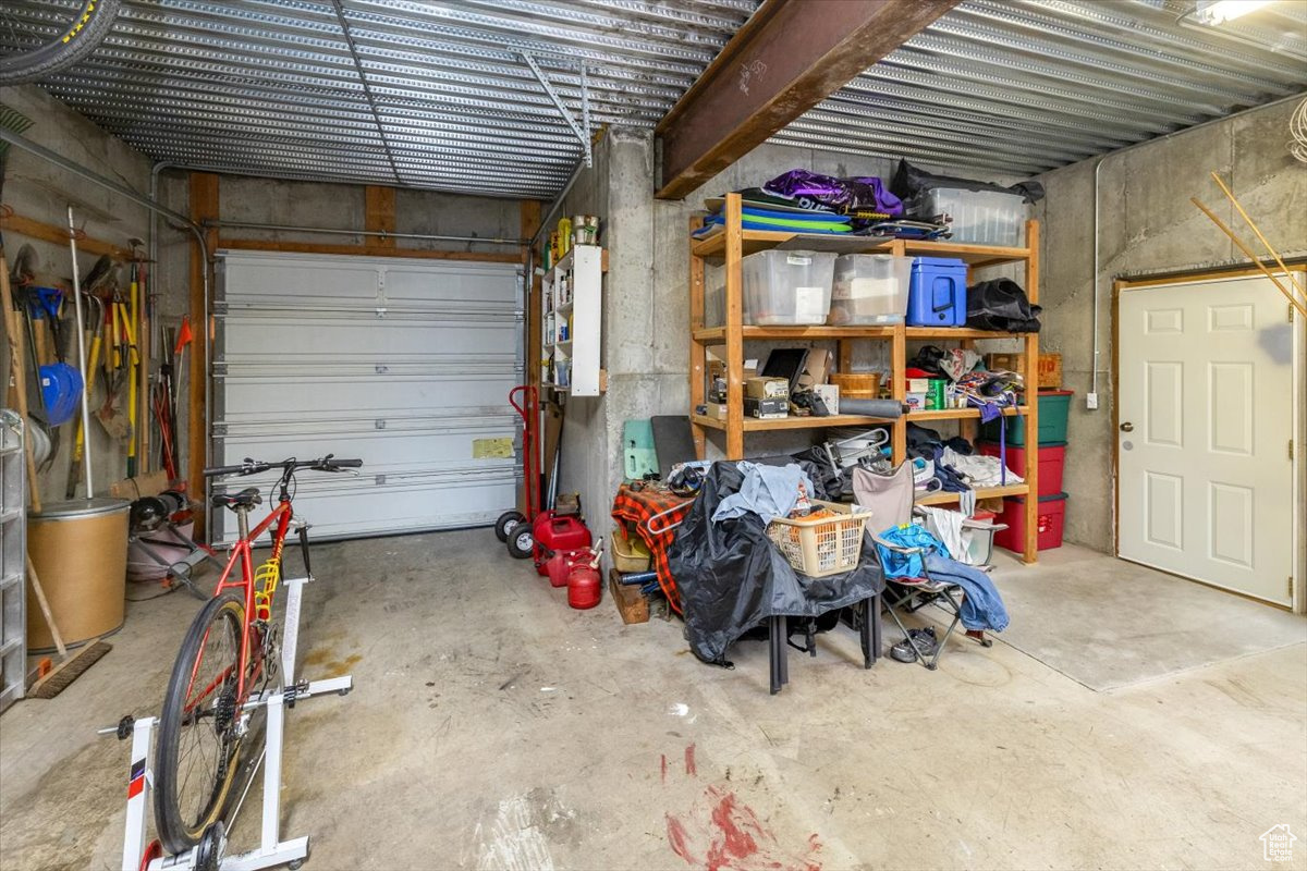 View of  1 car garage with large workshop area or storage