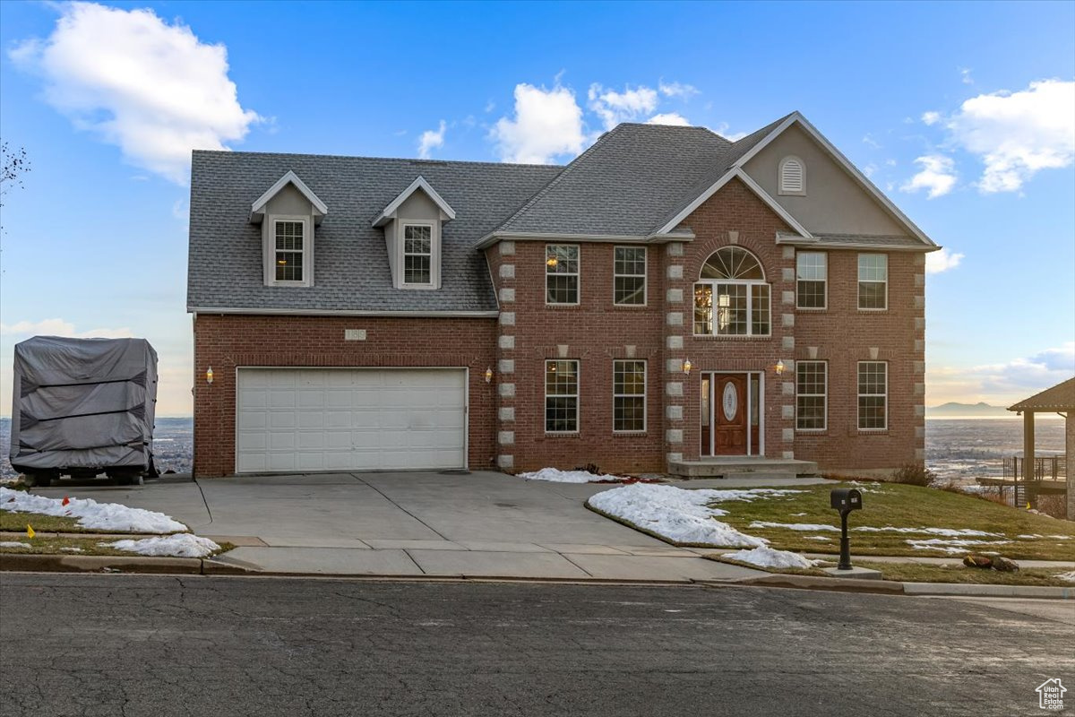 View of front of property with a garage