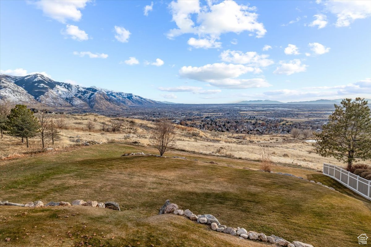 Property view of mountains with a rural view