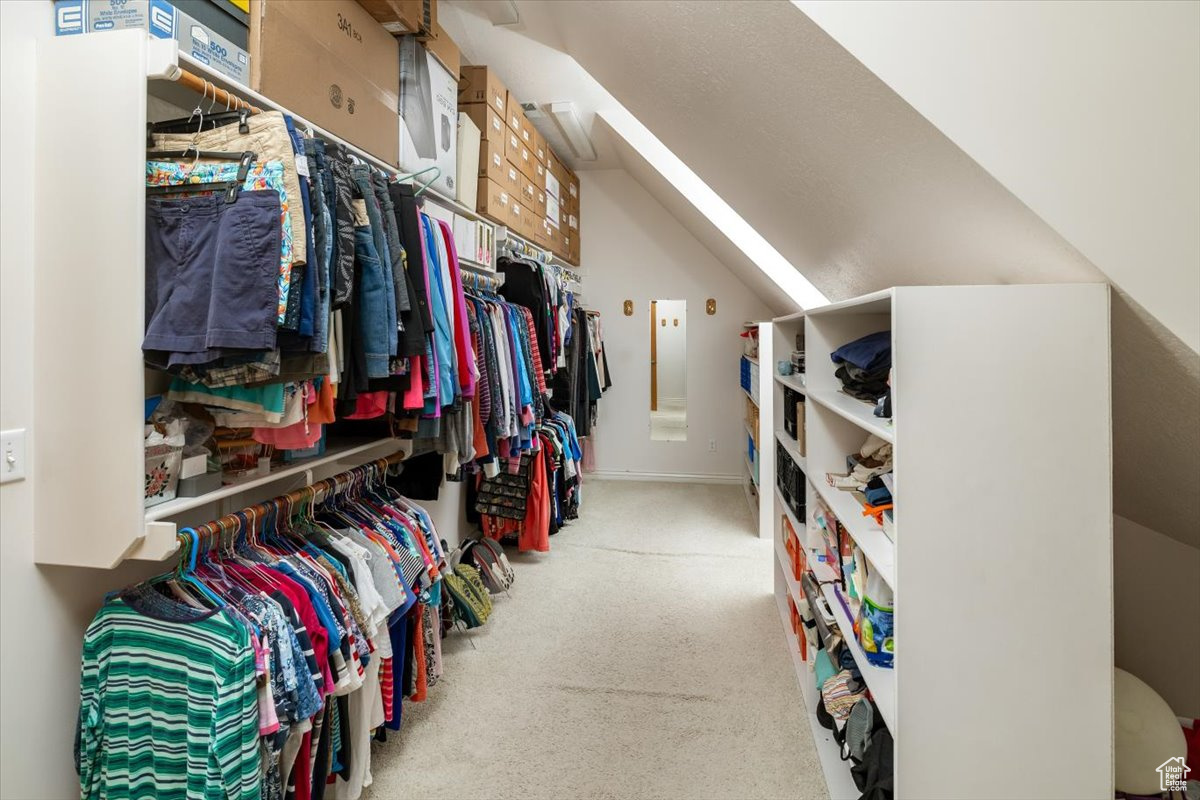 Spacious closet with lofted ceiling - Master suite