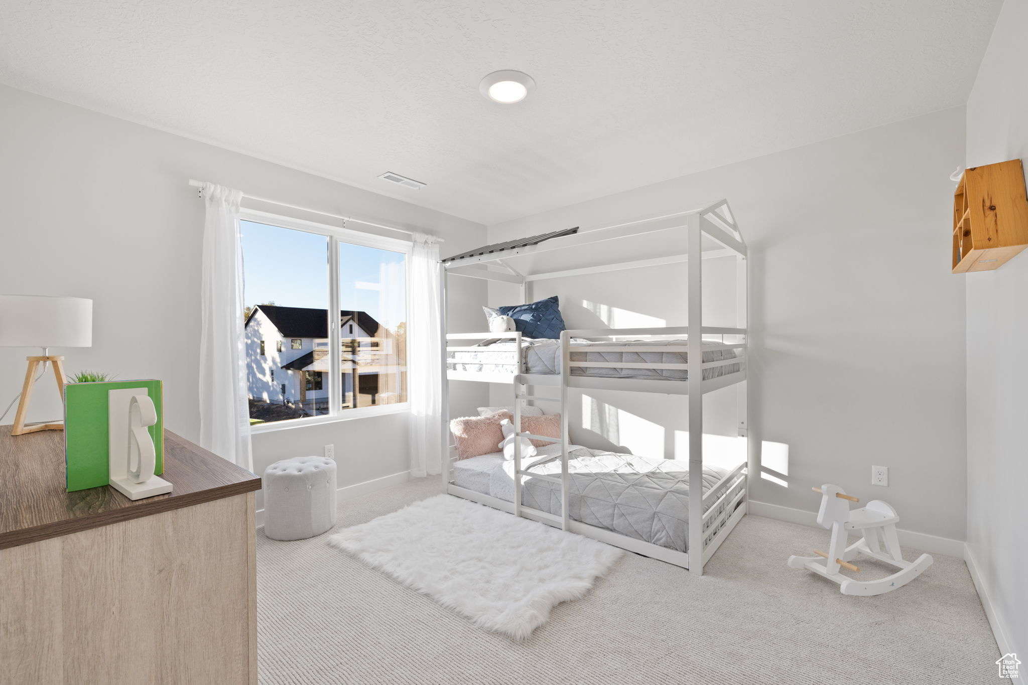 View of carpeted bedroom