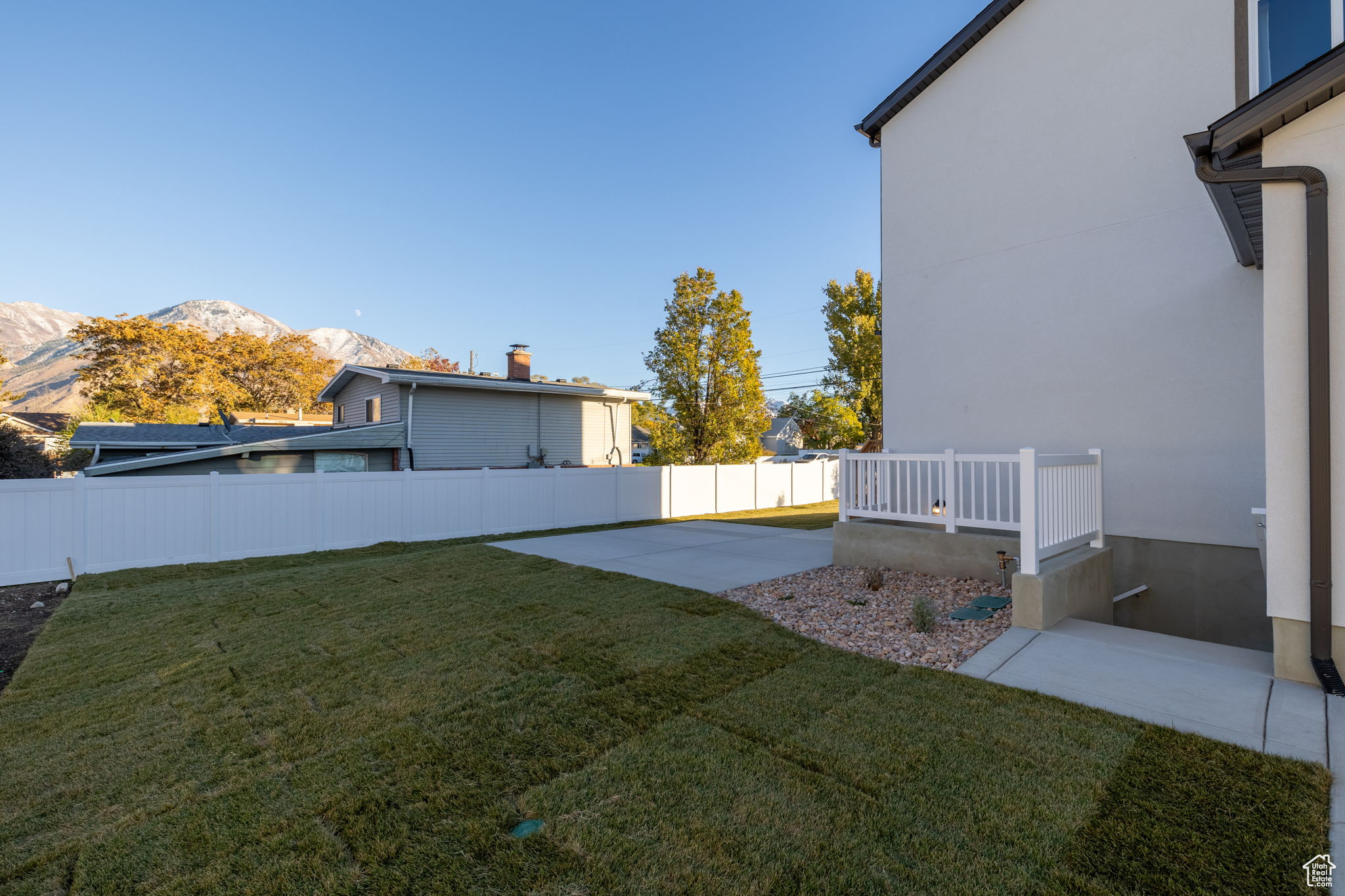 View of yard with a mountain view and a patio area