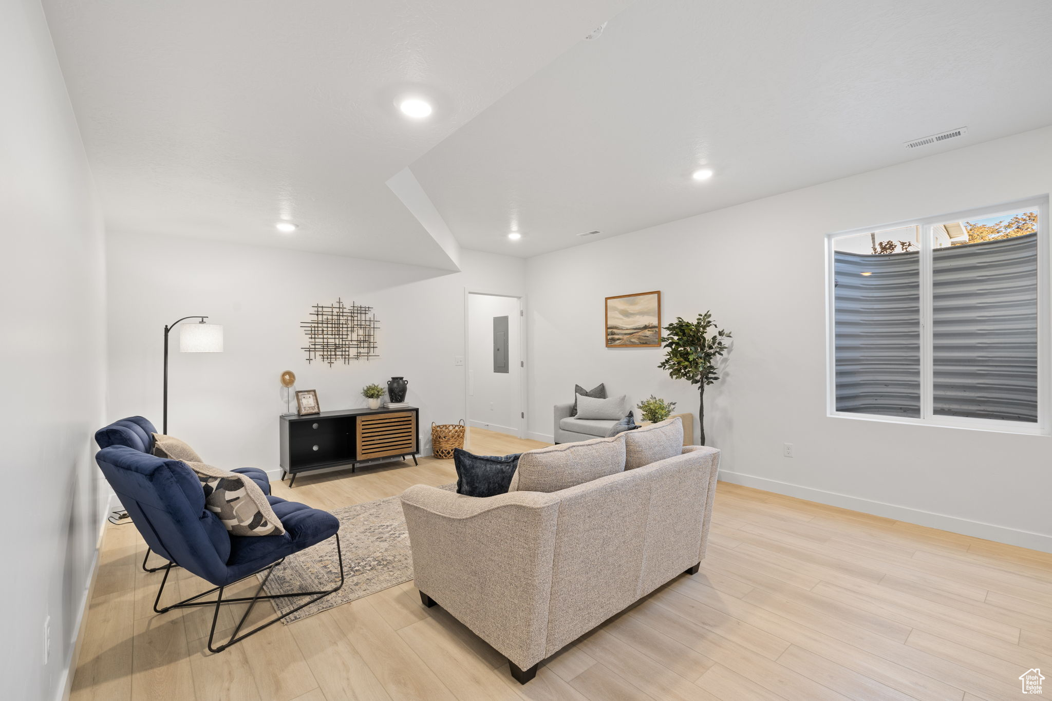 Living room featuring light hardwood / wood-style flooring