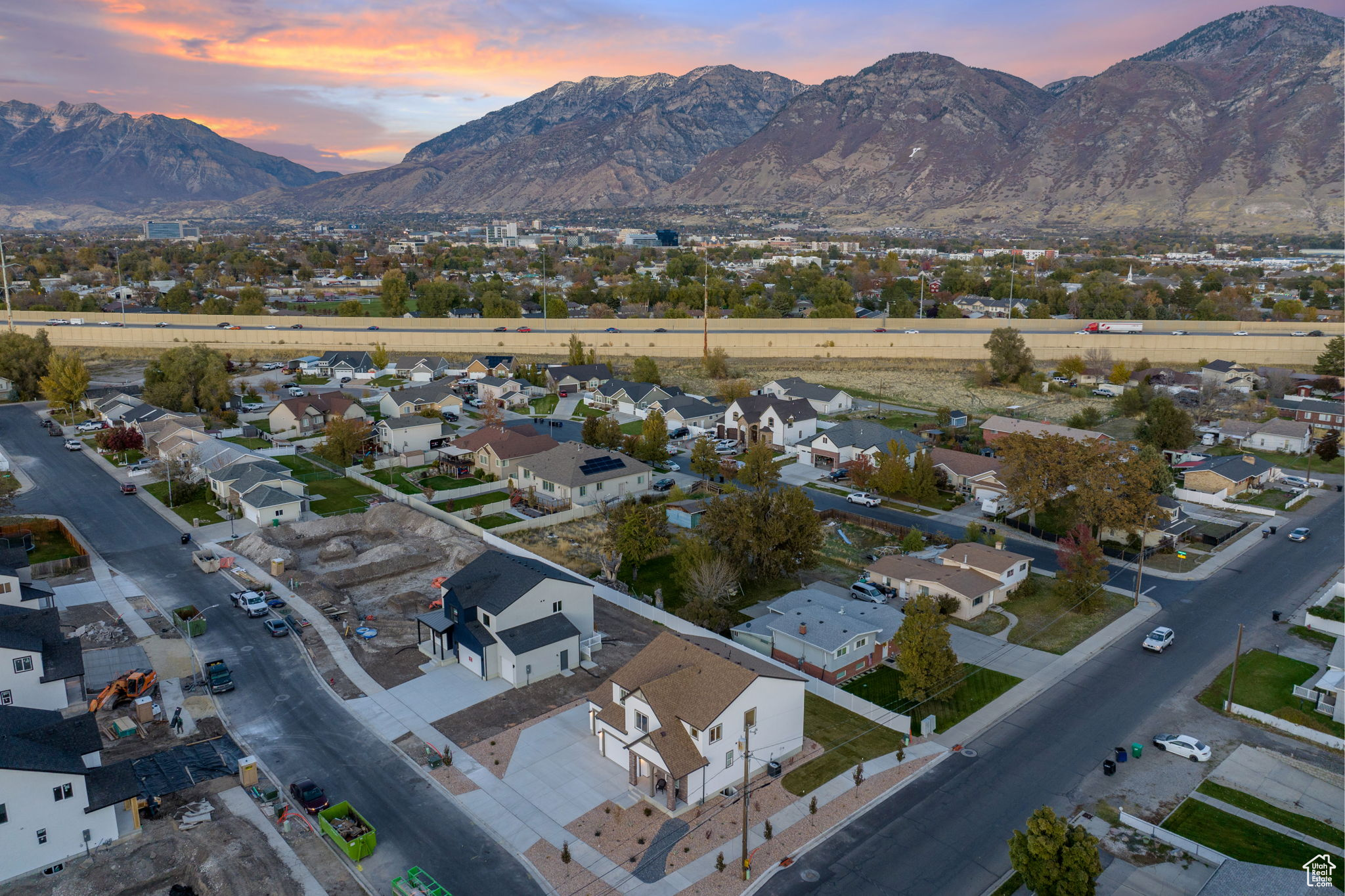 Aerial view at dusk featuring a mountain view