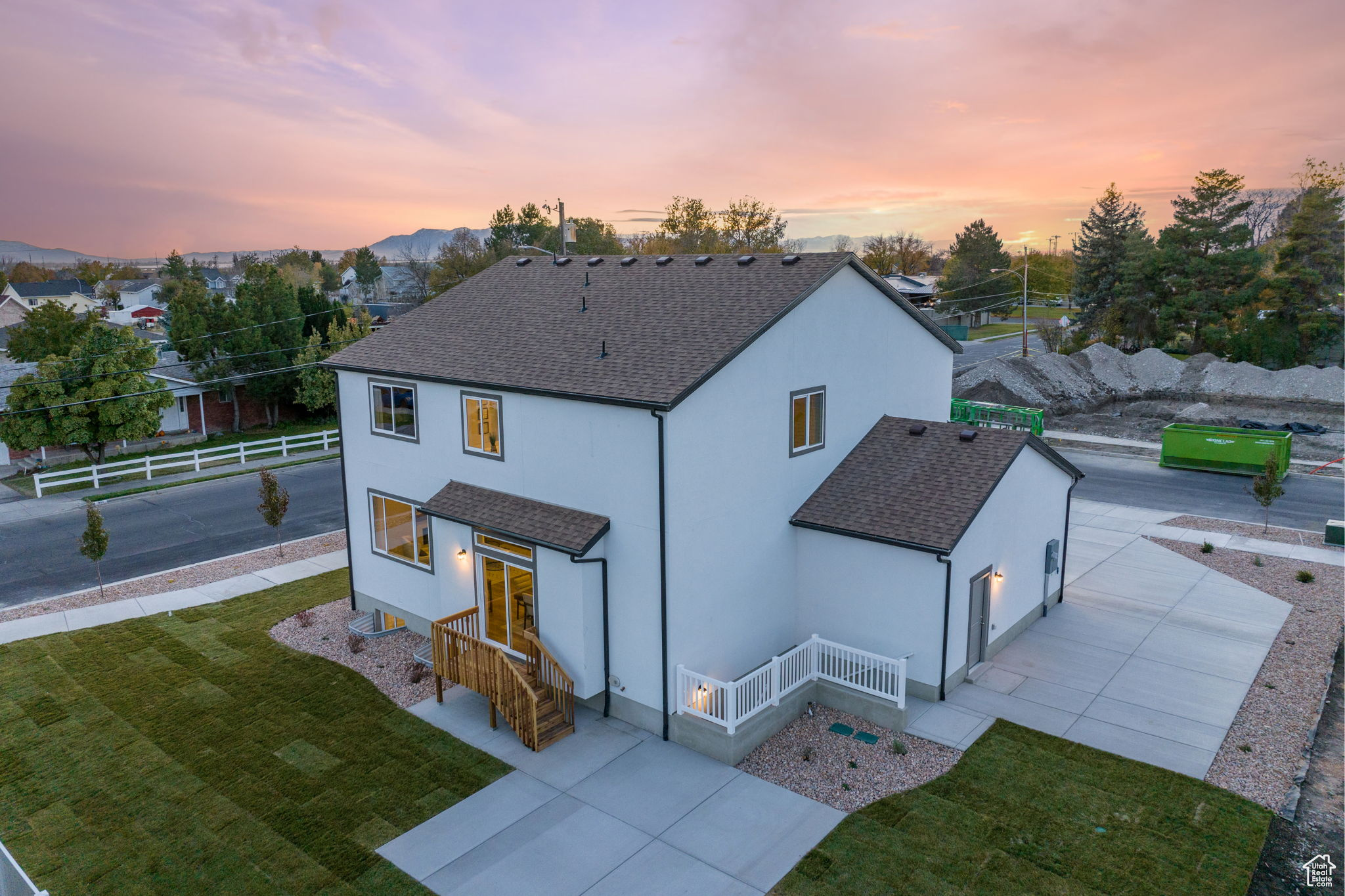 Exterior space with a yard and a garage