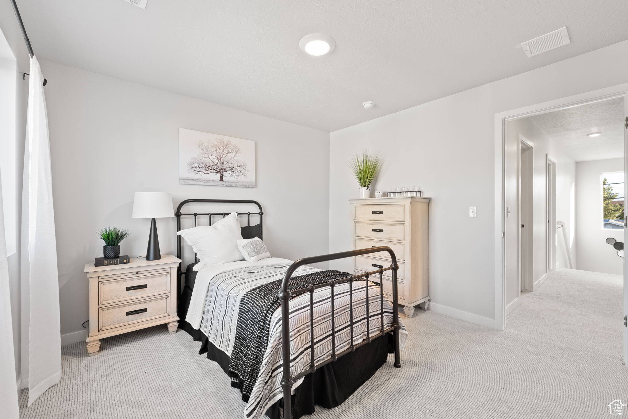 View of carpeted bedroom