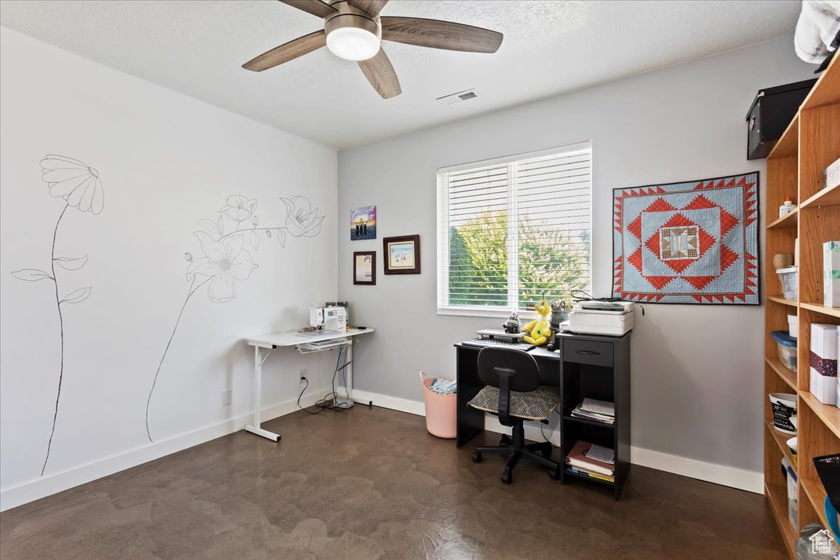 Office featuring ceiling fan