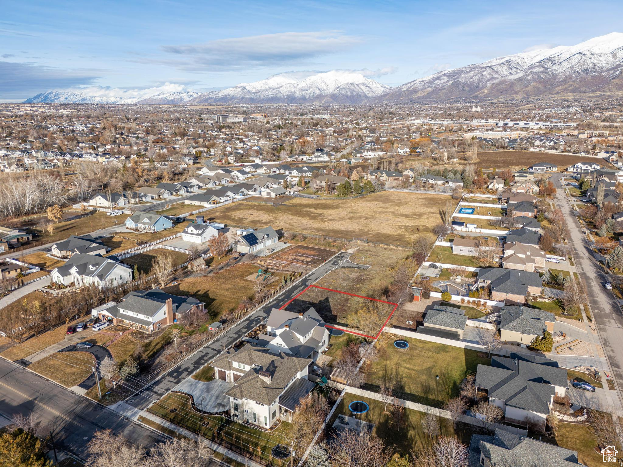 Birds eye view of property with a mountain view