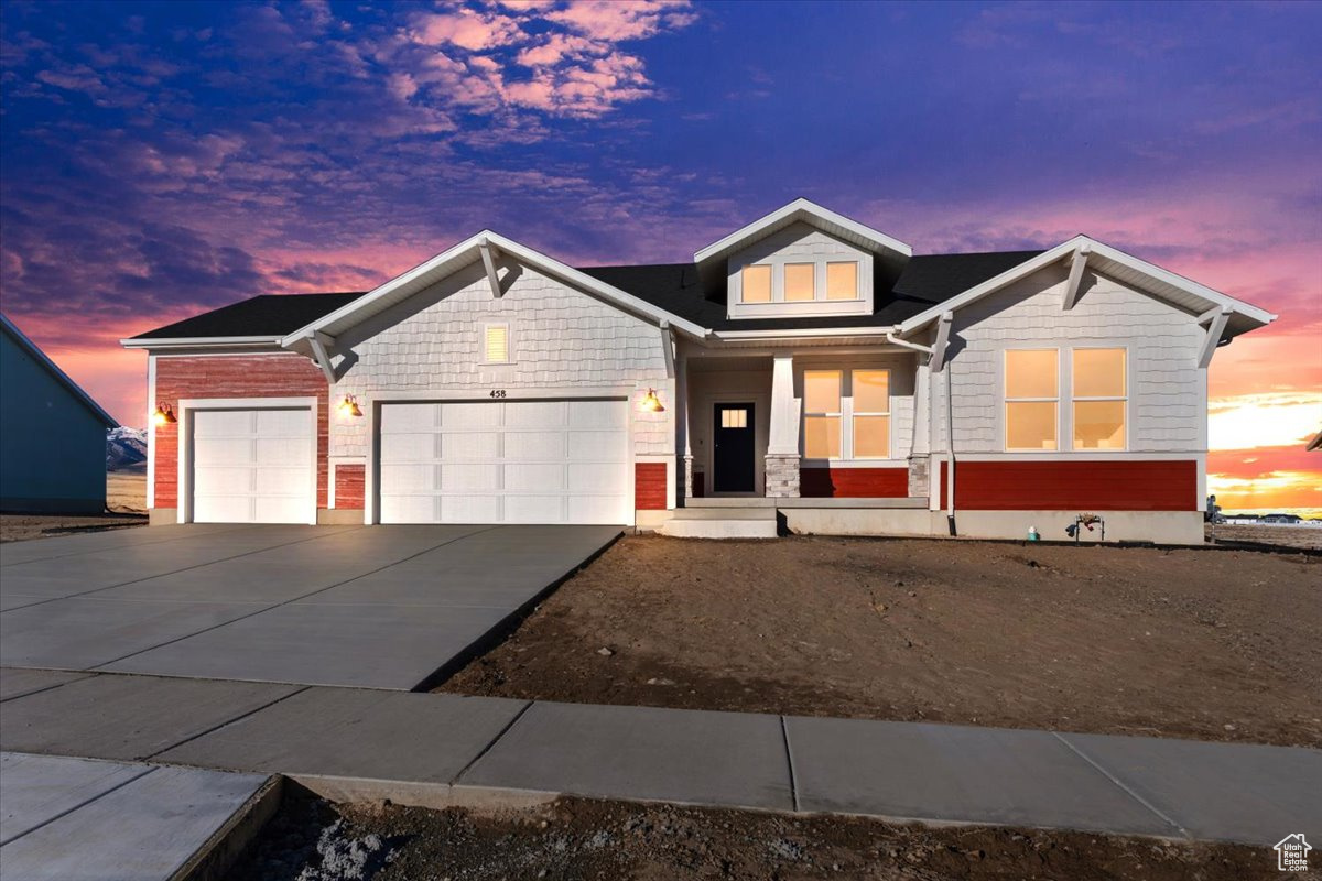 View of front of home featuring a 3-car garage