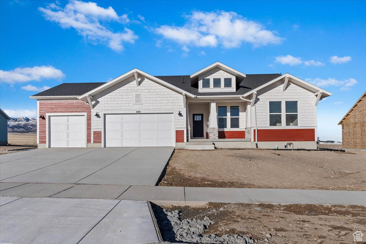 View of front facade with a 3-car garage