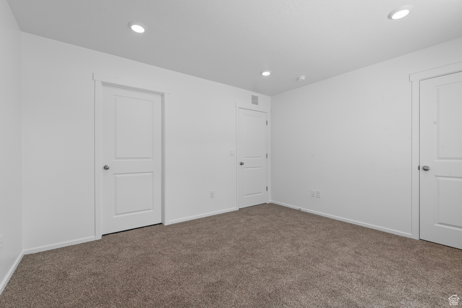 Primary bedroom featuring carpet