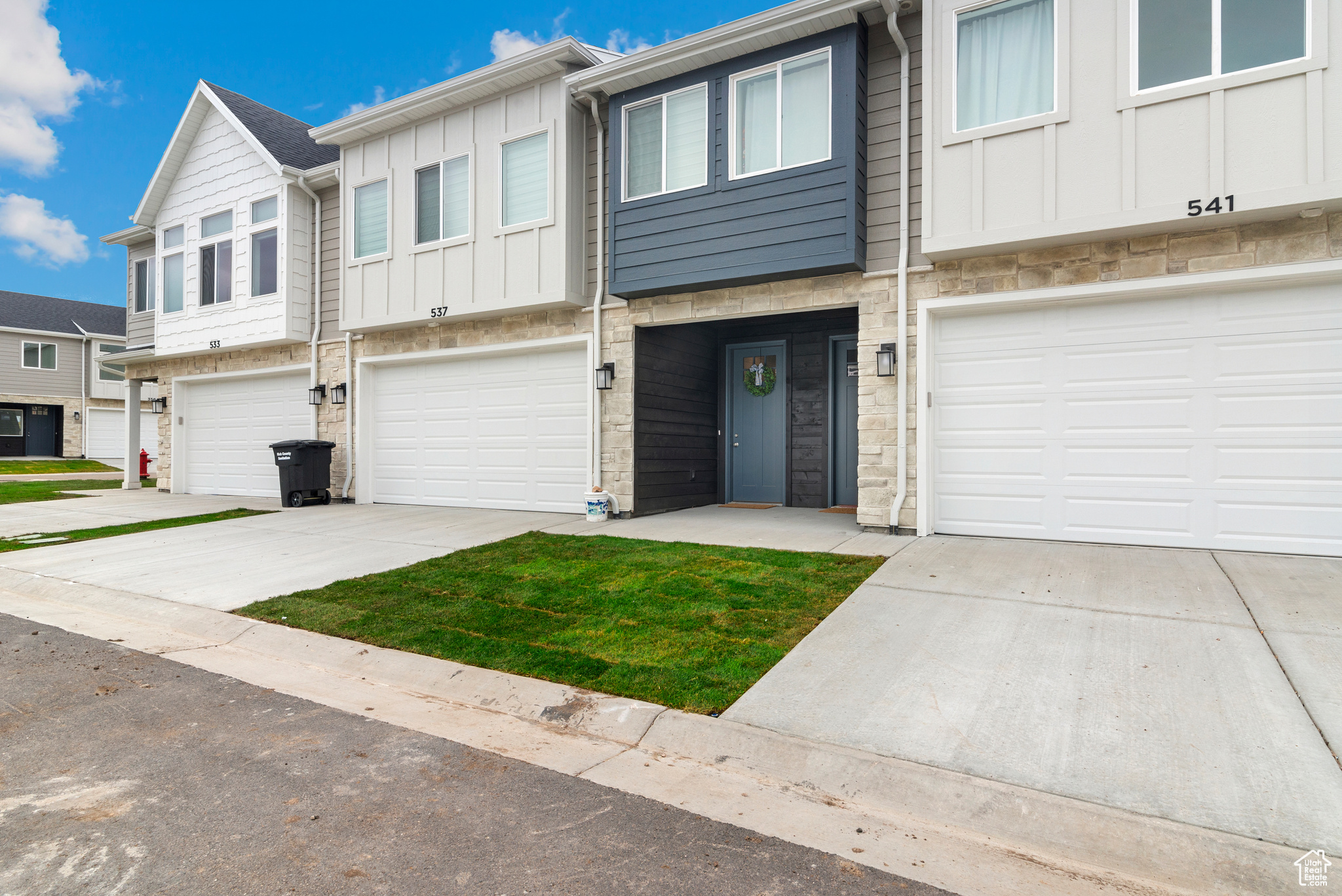 View of property featuring a garage