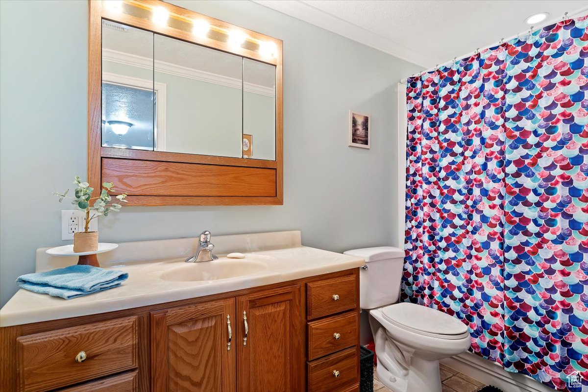 Basement bathroom with access to secondary bedroom.