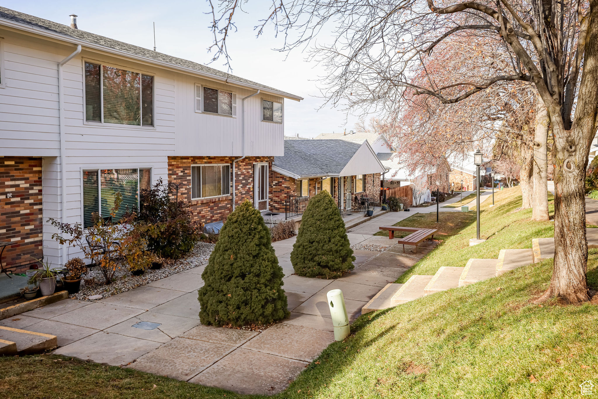 View of front of house featuring a front yard and a patio area