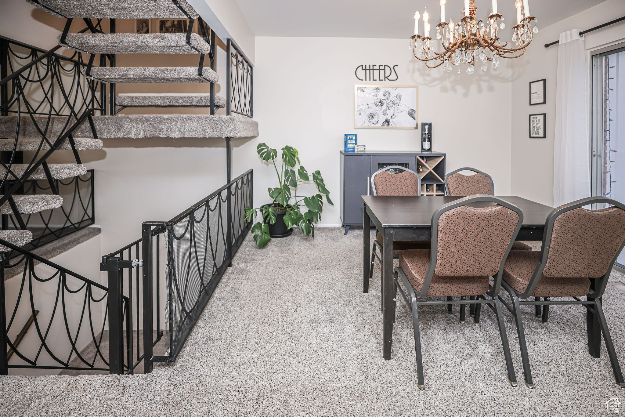 Dining room with a notable chandelier