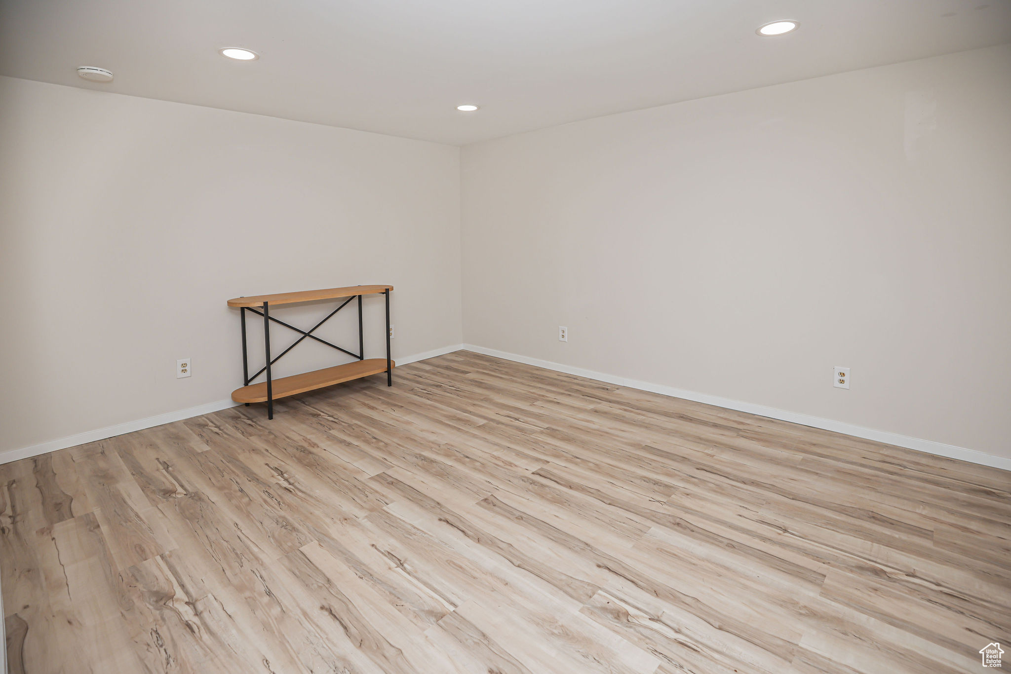 Unfurnished room featuring light hardwood / wood-style floors