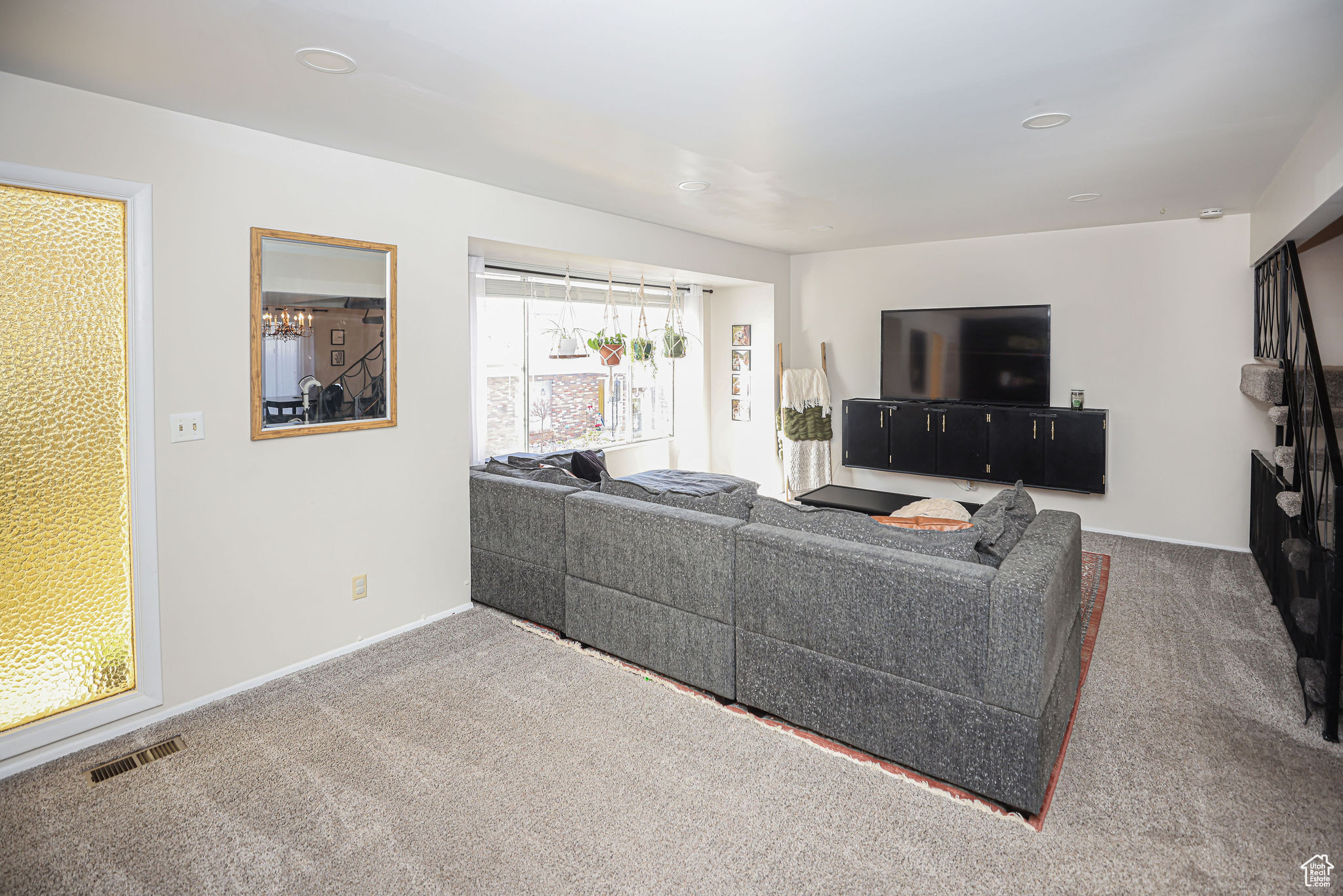 Living room featuring carpet floors