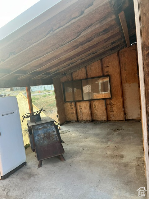 Interior space with vaulted ceiling