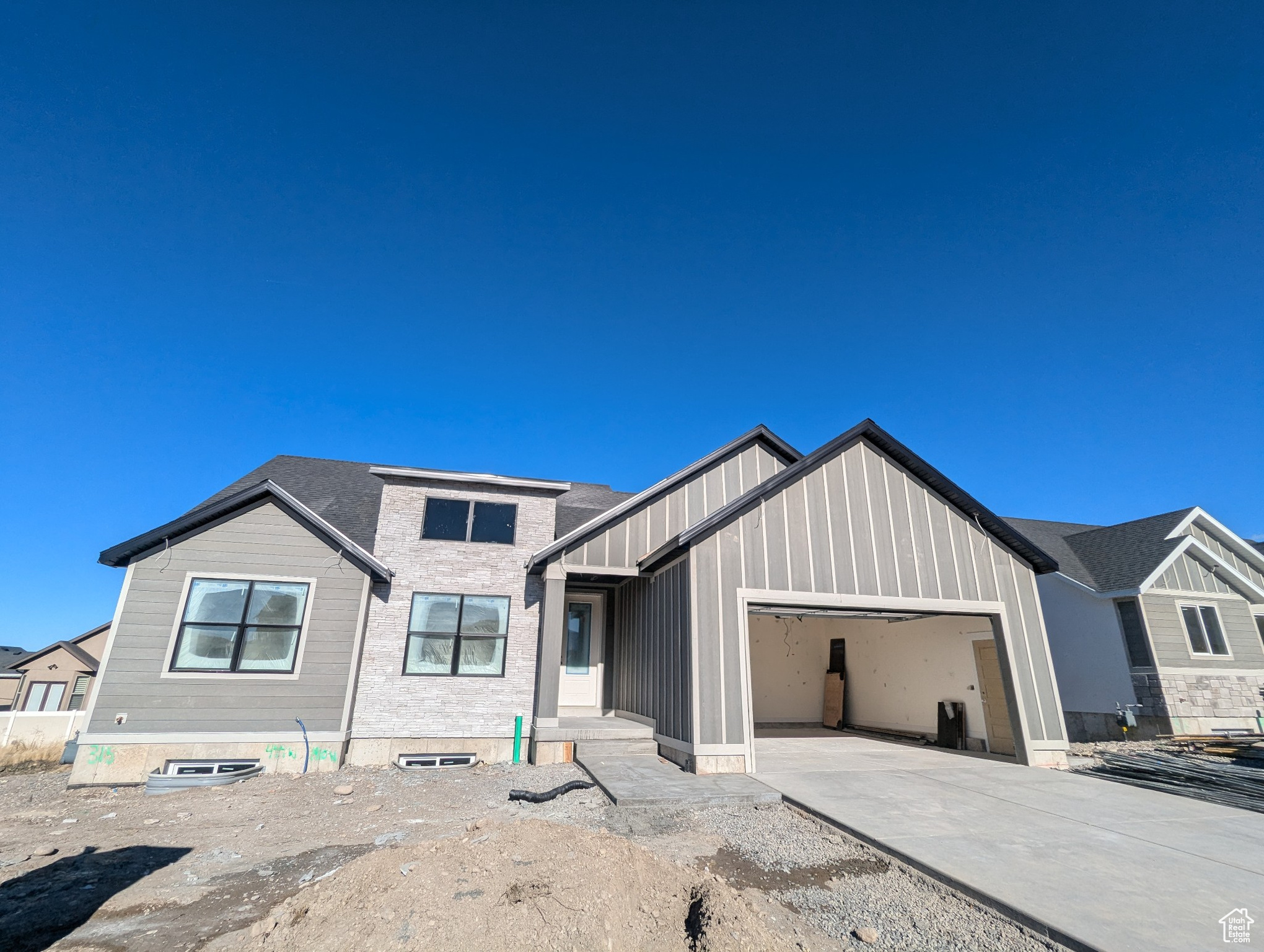 View of front of home featuring a garage