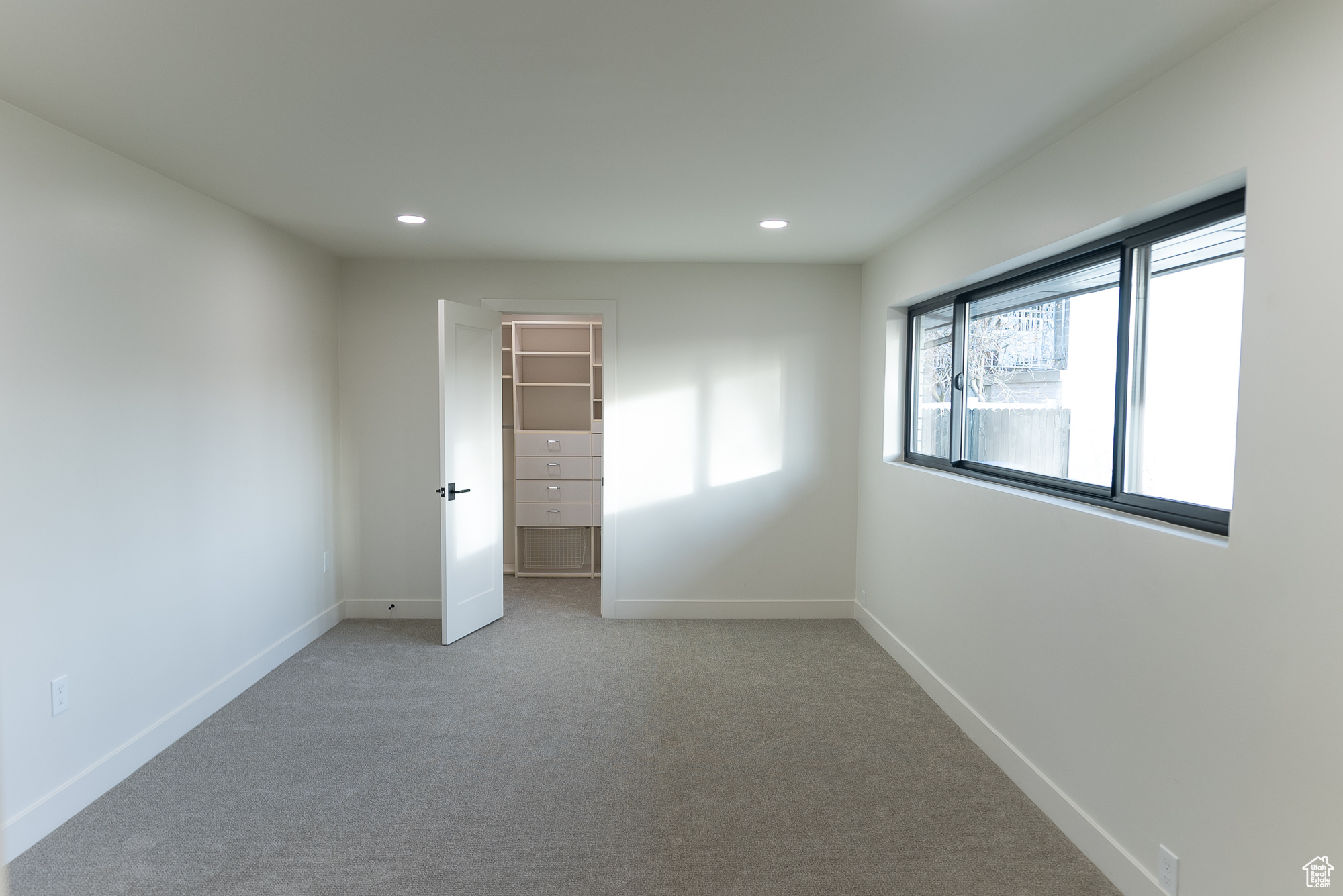 View of carpeted spare room