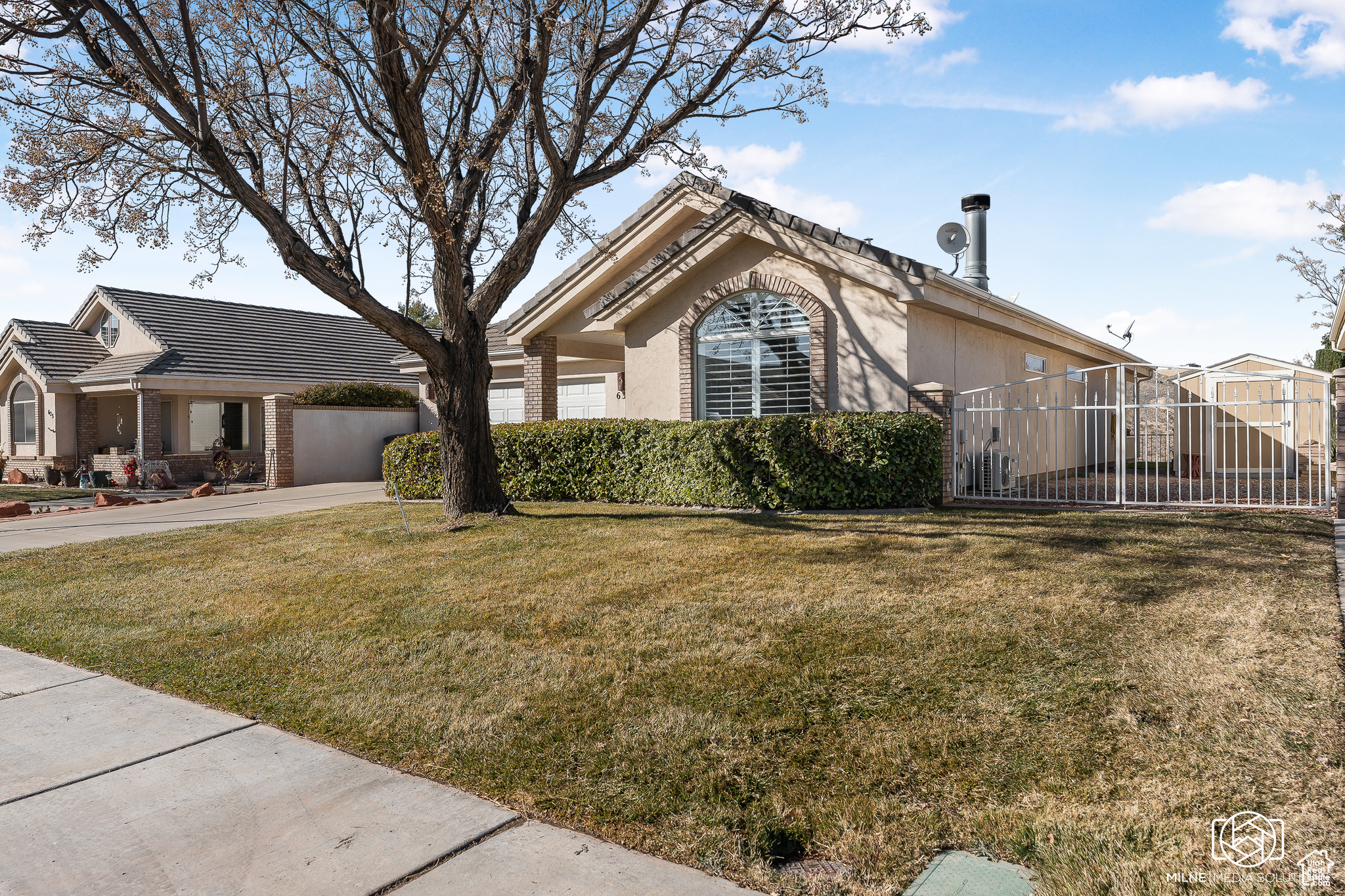 View of front of home featuring a front lawn