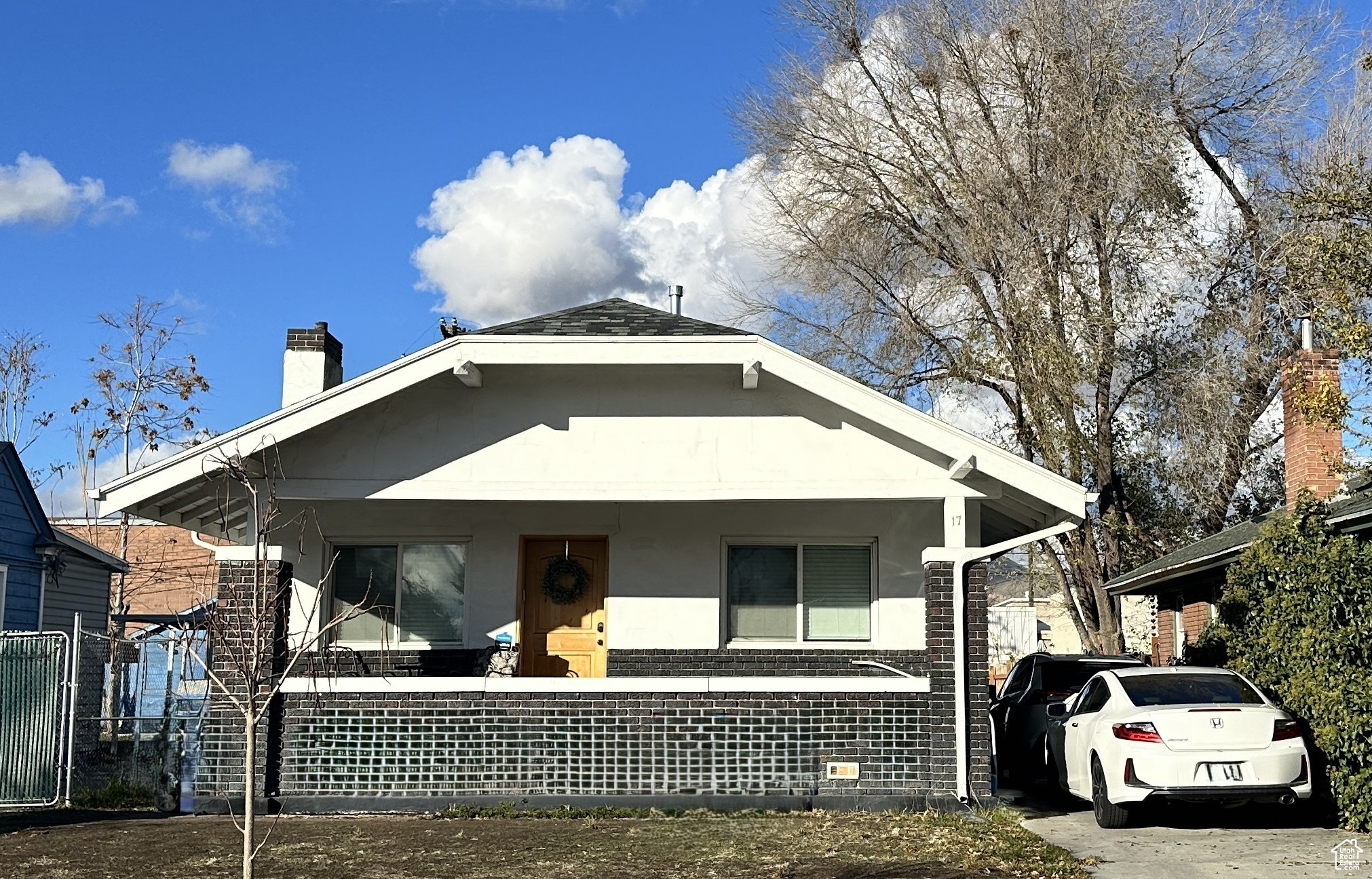 Bungalow featuring covered porch