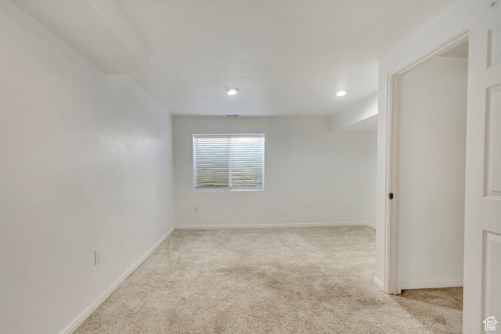 Family room featuring light carpet