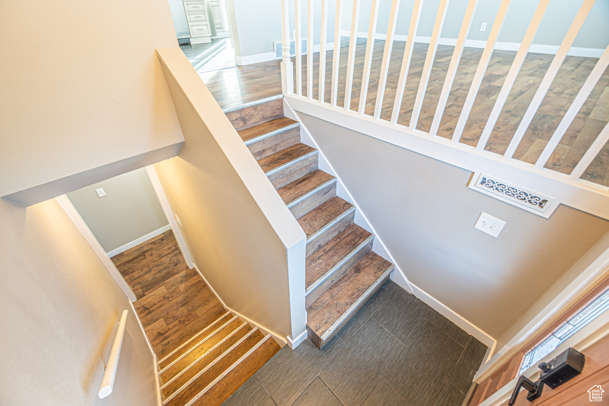 Stairway with wood-type flooring