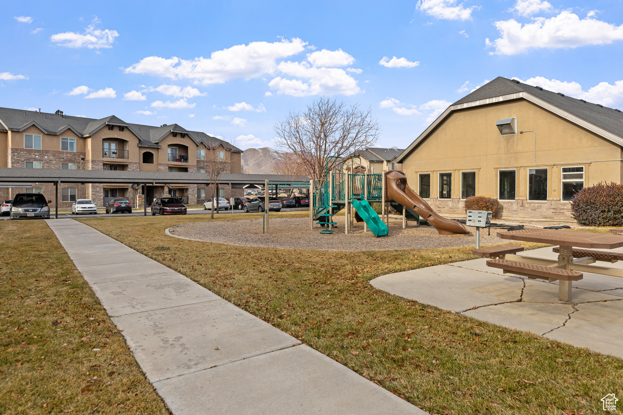 View of jungle gym with a yard