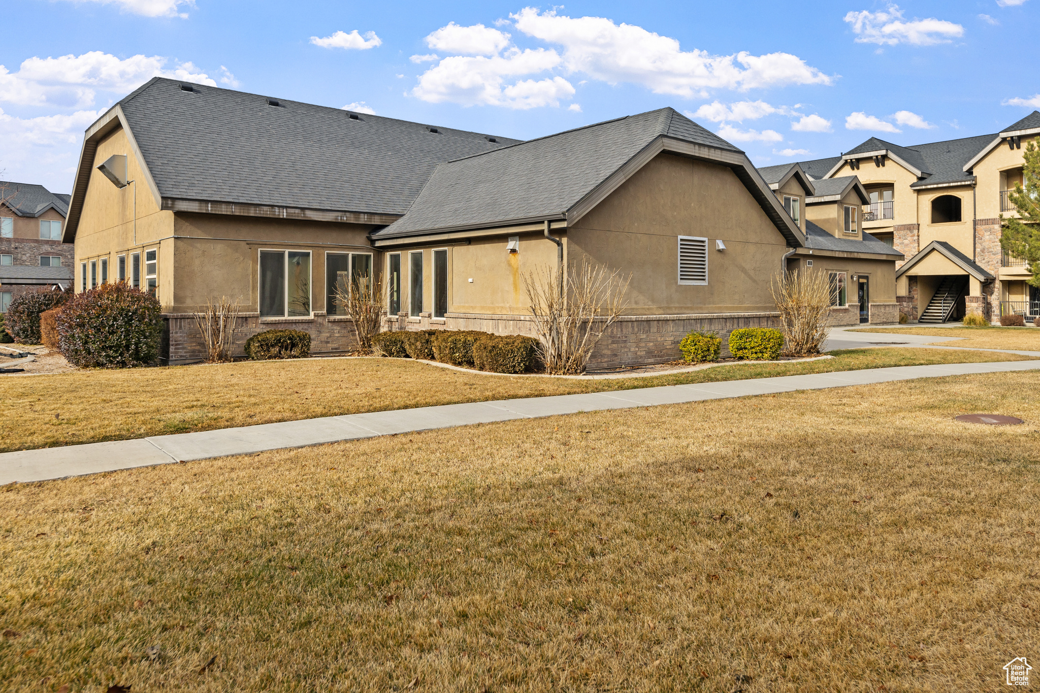 View of front of property with a front lawn