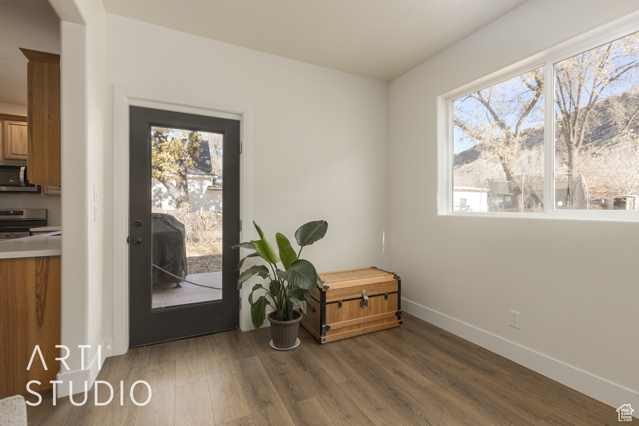 Interior space with dark wood-type flooring